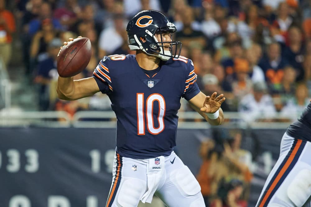 Chicago Bears quarterback Mitchell Trubisky (10) throws the football in game action during an NFL game between the Chicago Bears and the Seattle Seahawks. He needs a big game to silence the haters, and our betting pick is backing him and the bears to cover the spread.