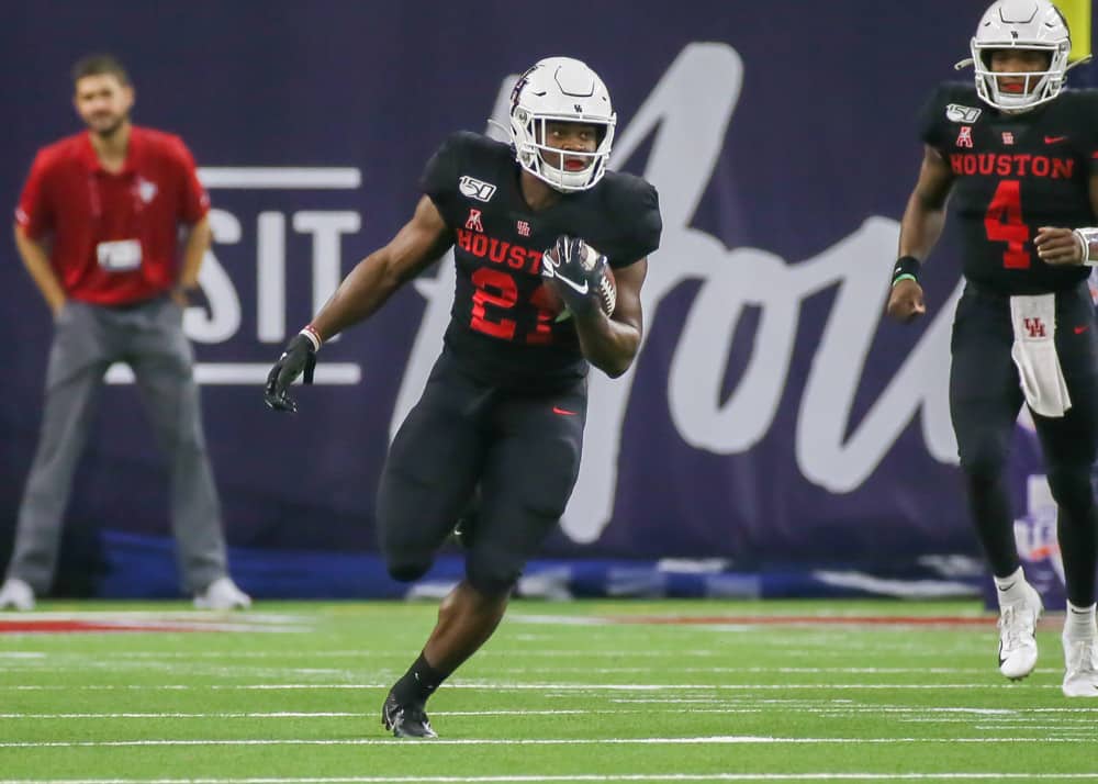 Houston Cougars running back Kyle Porter (22) carries the ball during the AdvoCare Kickoff college football game between the Washington State Cougars and Houston Cougars at NRG Stadium. The game flattered Houston and that's why we're betting on Tulane.