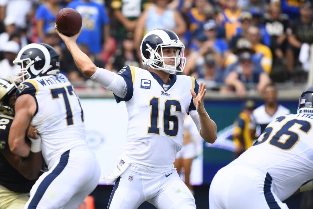 Los Angeles Rams Quarterback Jared Goff (16) throws the ball during an NFL game between the New Orleans Saints and the Los Angeles Rams. Can he inspire the Rams to victory? Our betting pick is backing the Rams on the spread.